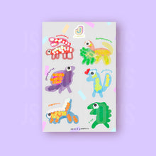 Load image into Gallery viewer, Vinyl Waterproof Sticker Sheet, J’s Dino’s - Crayons &amp; Glitter