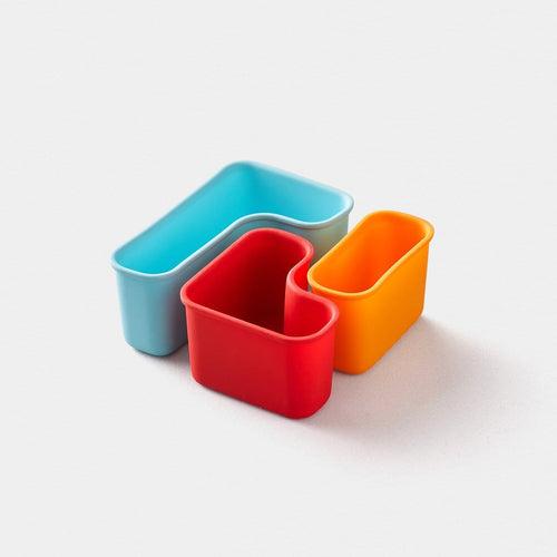 PlanetBox Puzzle Pod trio in blue, red, orange